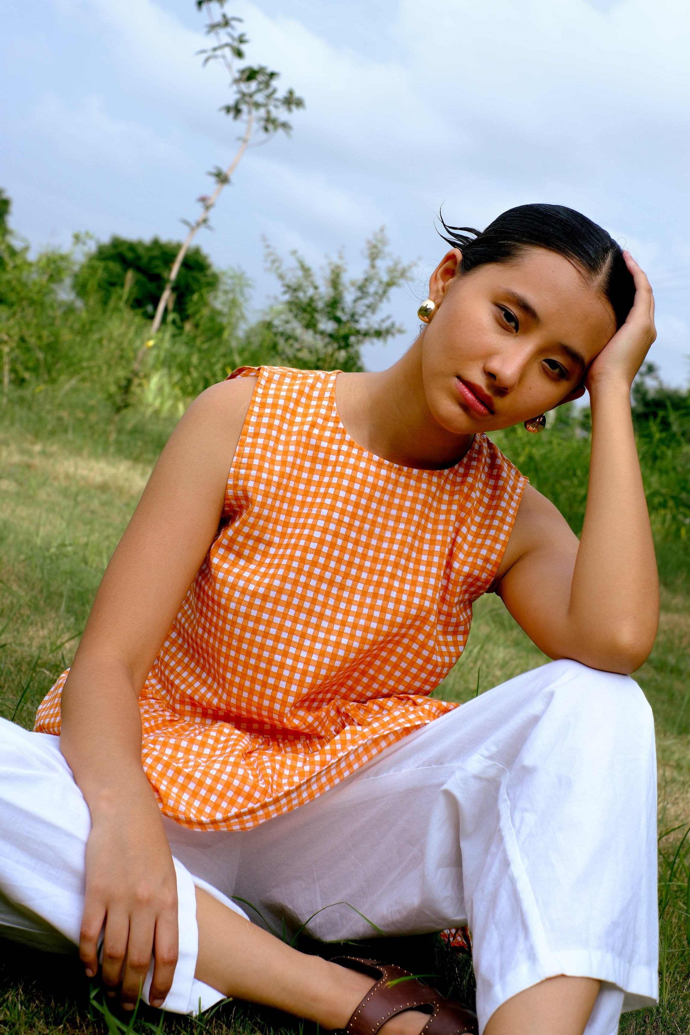 orange checks sleeveless peplum top