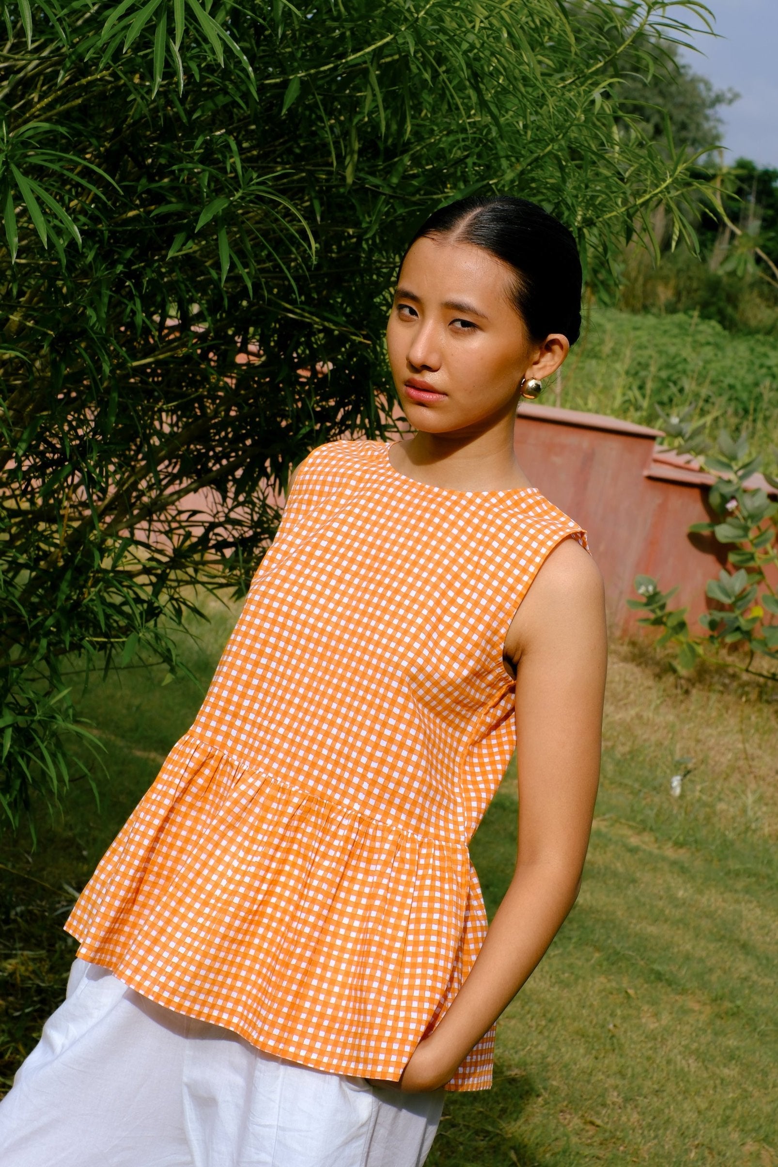 orange cotton sleeve less top